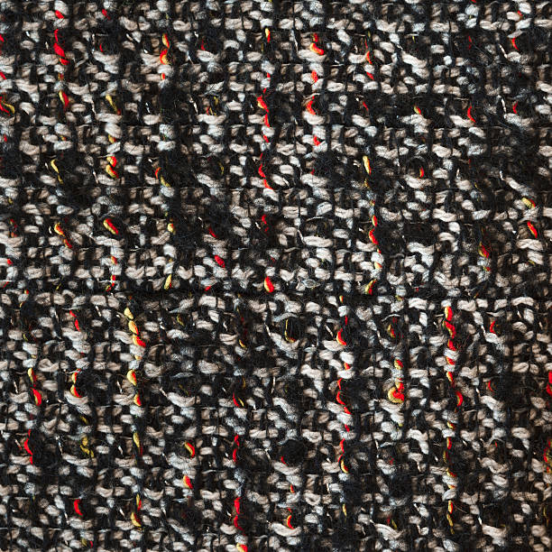 istock Bottle green woven woolen fabric texture. Black, white, red melange. 524027484