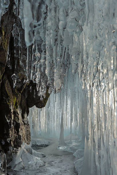 istock Ice stalactites and stalagmites in the rock 524028378