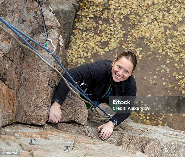 Smiling Female Climber And Her Ropes Stock Photo - Download Image Now - Adult, Adventure, Autumn