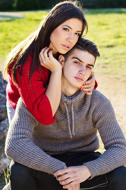 istock Young happy couple in the  park 524030279