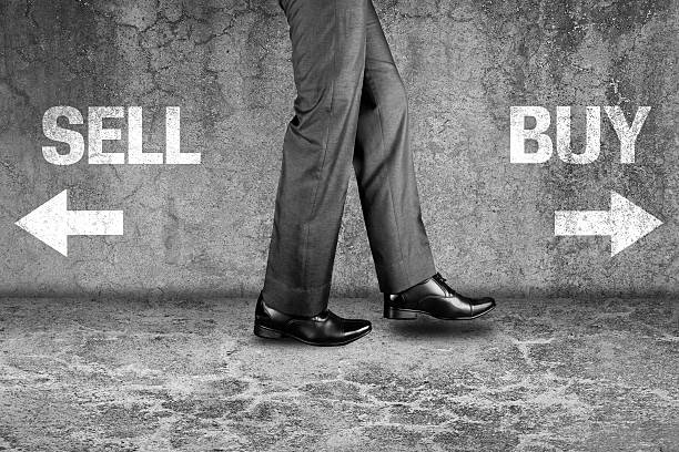 istock Sell or Buy written text on dirty wall 524032004