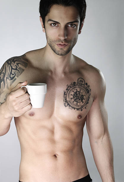 istock Handsome young man drinking his morning coffee 524032354