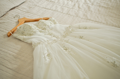 wedding dress are placed on the bed, preparations for the wedding