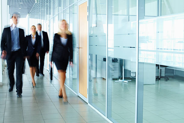 istock Businesspeople in corridor 524035008