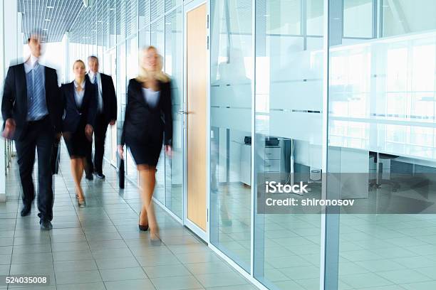 Businesspeople In Corridor Stock Photo - Download Image Now - Business Person, Office, Motion