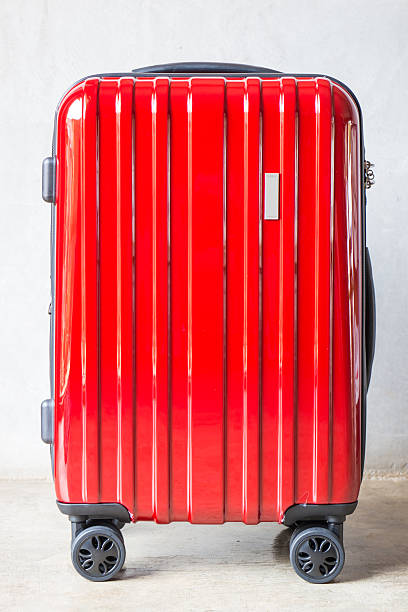 istock Red travel suitcase for outgoing 524035856