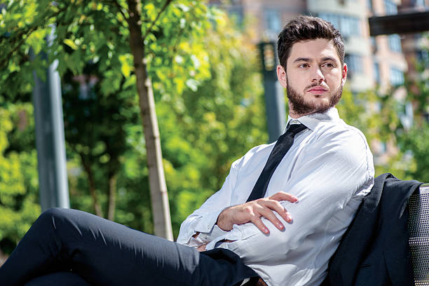 istock Rest at dinner! Young businessman with a beard sitting on 524050643