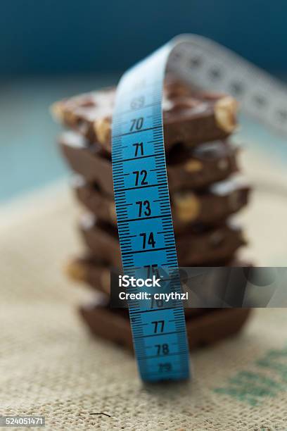 Chocolate And Tape Measure Diet Concept Stock Photo - Download Image Now - Absence, Accuracy, Affectionate