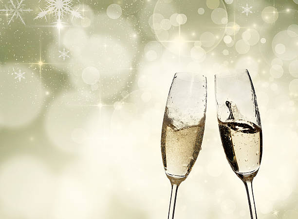 istock Toasting with champagne glasses on sparkling holiday background 524052371