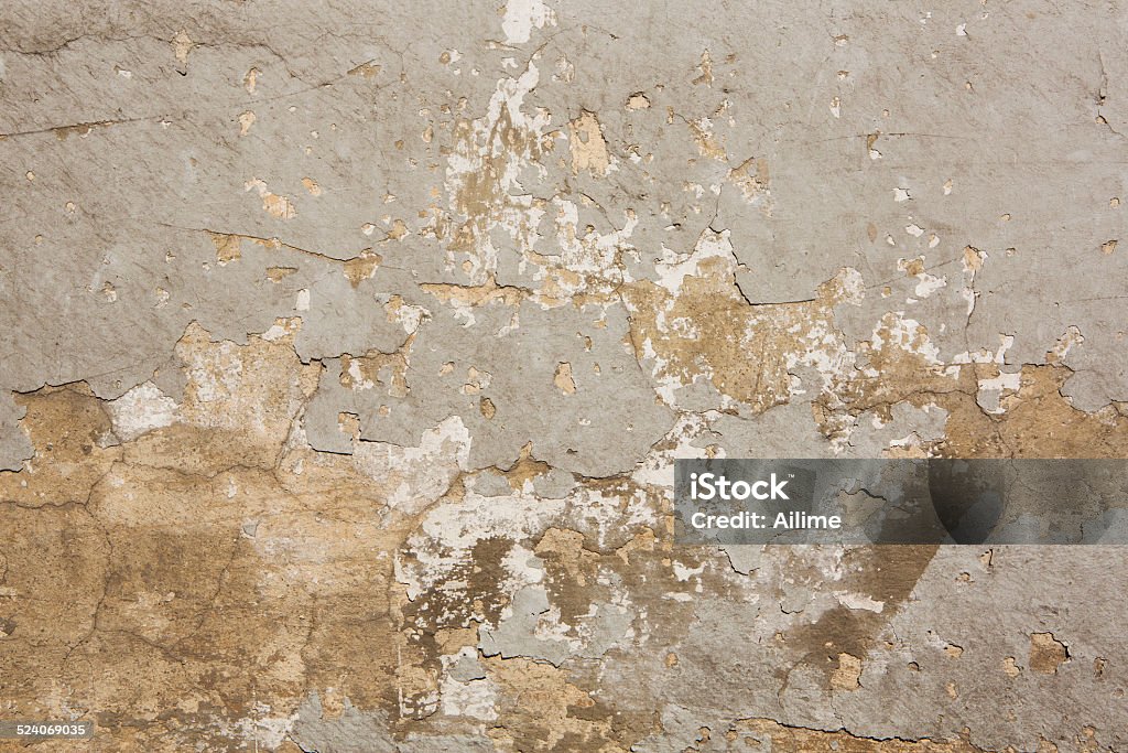 Weathered wall Run-down grungy wall. Backgrounds Stock Photo