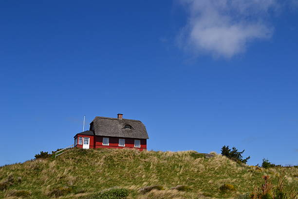 istock Old-Style Traditional Danish House on a Sand Dune 524070725