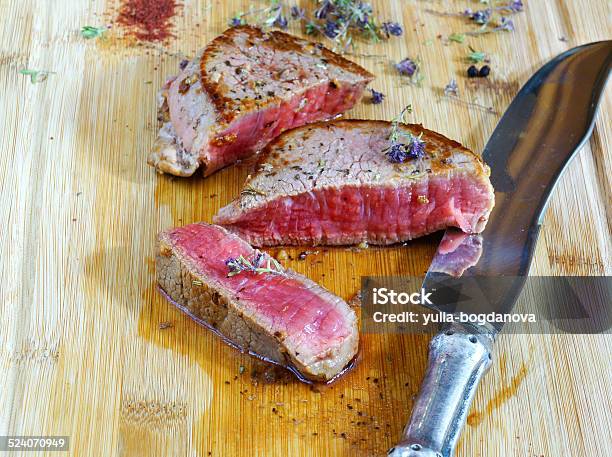 Beef Steak Rare On The Wooden Cutting Board Stock Photo - Download Image Now - Barbecue - Meal, Beef, Circle