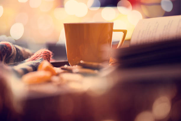 cup of hot cocoa on a background of fire