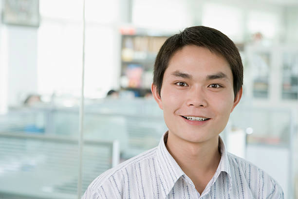 istock Businessman smiling, portrait 524087233