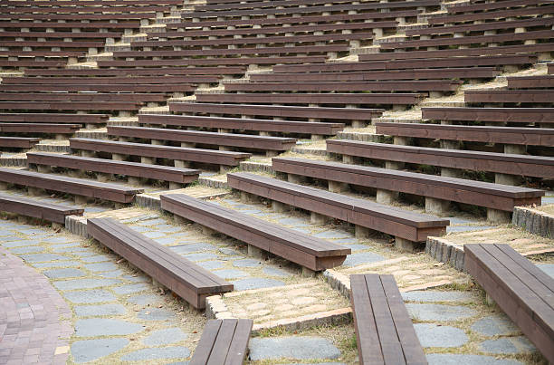 istock rows of wooden seats 524087371