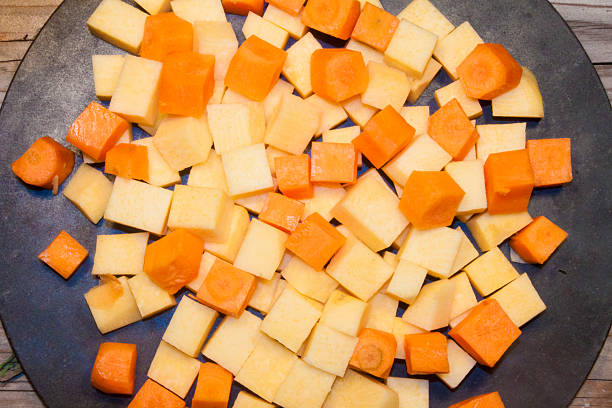 istock Swede and carrot dice, on a stone plate 524087877