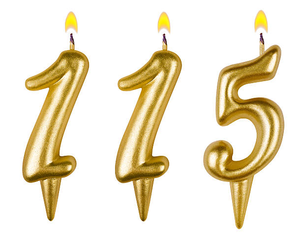 istock candles number one hundred fifteen isolated on white background 524088317