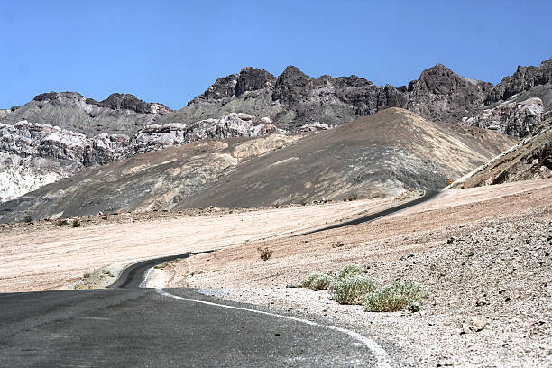 Curvy road in Death valley mountains stock photo