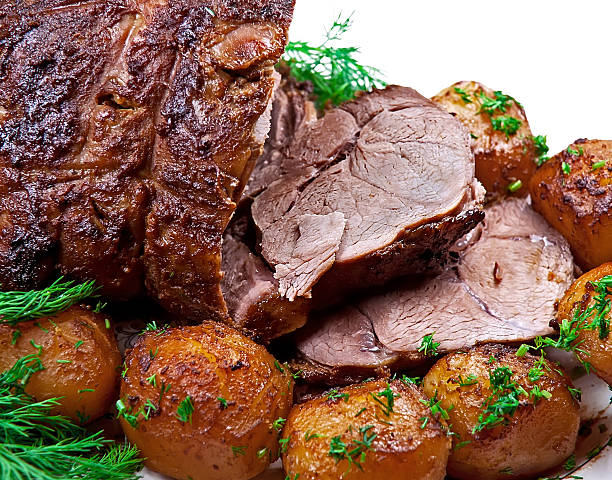 istock Roast leg of lamb on white background. 524091193
