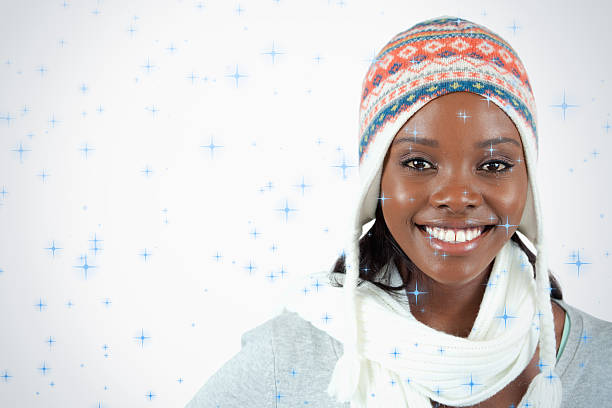 Hello winter. happy trendy middle aged woman in sweater, mittens, hat and scarf isolated on white background with snowflake.