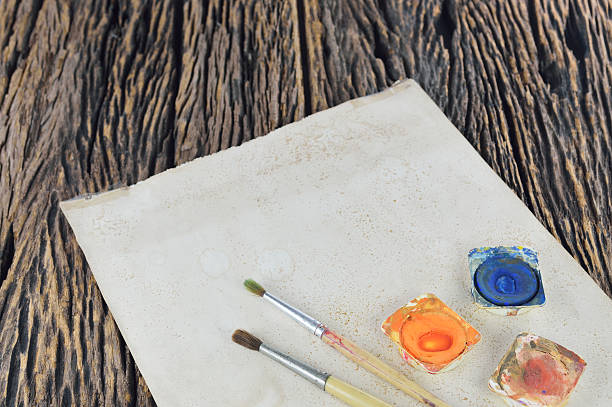 istock Watercolor paints and old paper 524091697