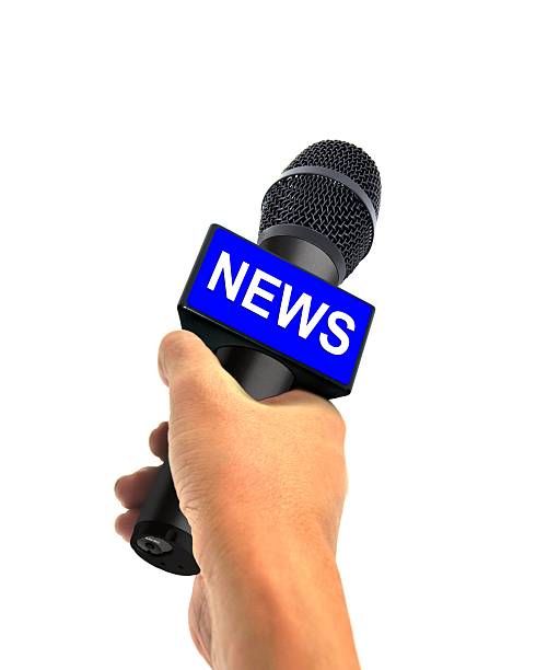 istock Hand Holding Wireless News Microphone 524091795