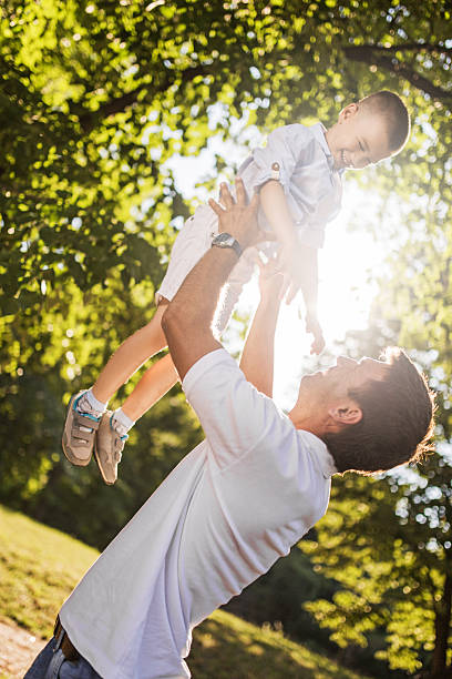 istock Playful father and son in nature. 524126909