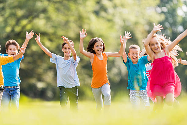 istock Children having fun in the park. 524127881