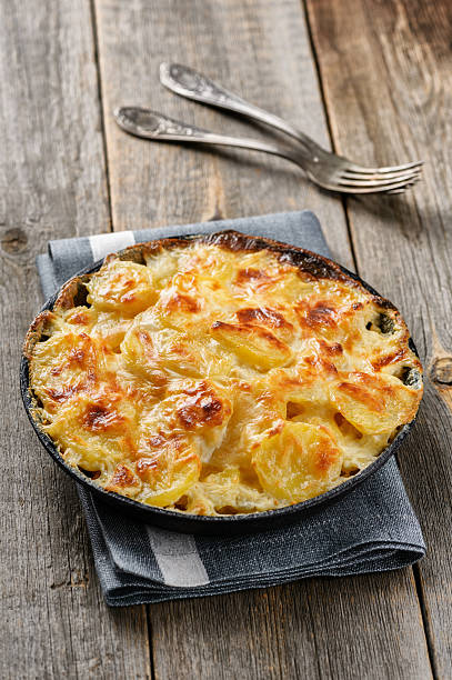 istock Potato gratin in casserole with cream and cheese 524128707