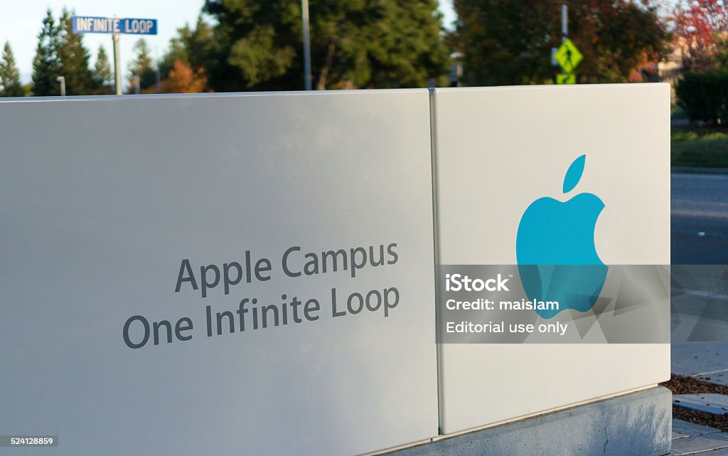 Apple headquarters at Infinite loop in Cupertino, CA. Сupertino, CA, USA - November 15, 2014: Apple headquarters on Nov 15, 2014 at Infinite loop in Cupertino. Apple Inc. is a multinational company, that develops consumer electronics, and computer software. Apple Computers Stock Photo
