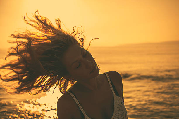 istock beautiful woman and sunbeams 524129121