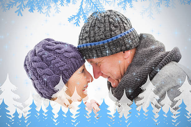 istock Happy mature couple in winter clothes embracing 524129519