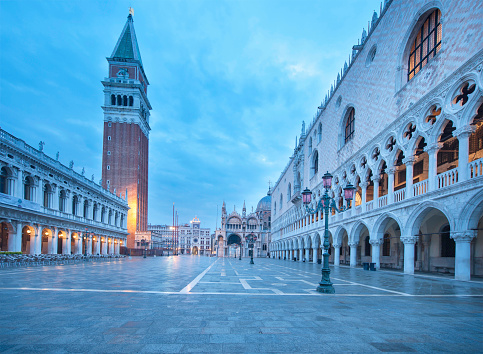 The Doge's Palace, Venice, at night and the belltower (left) from the lagoon looking across the Piazzale to St Mark's Square