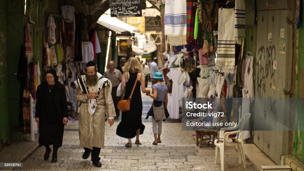 People walking in the shopping street in  Jerusalem Jerusalem, Israel - September 13, 2014: People walking in the shopping street in a Jerusalem, Israel Capital Cities Stock Photo