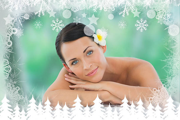 istock Beautiful brunette relaxing on massage table smiling at camera 524133215