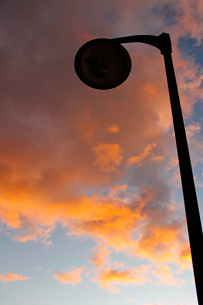 istock Yellow Blue Sunrise Sky With Sunlight With Street Lights 524134477
