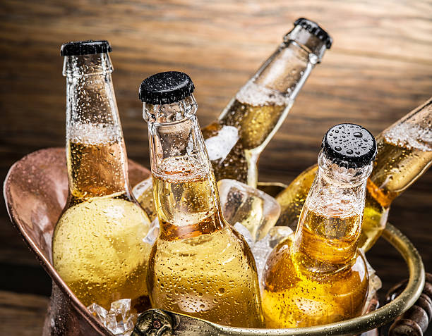 istock Cold bottles of beer in the brazen bucket. 524148406