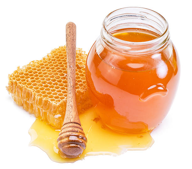 istock Jar full of fresh honey and honeycombs. 524149434