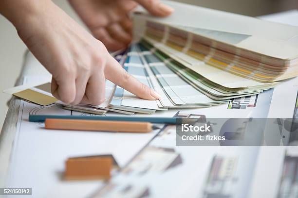 Young Designer Working With Color Palette Stock Photo - Download Image Now - Interior Designer, Color Swatch, Indoors