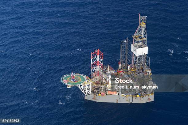 Helicopter Pick Up Passenger On The Offshore Oil Rig Stock Photo - Download Image Now