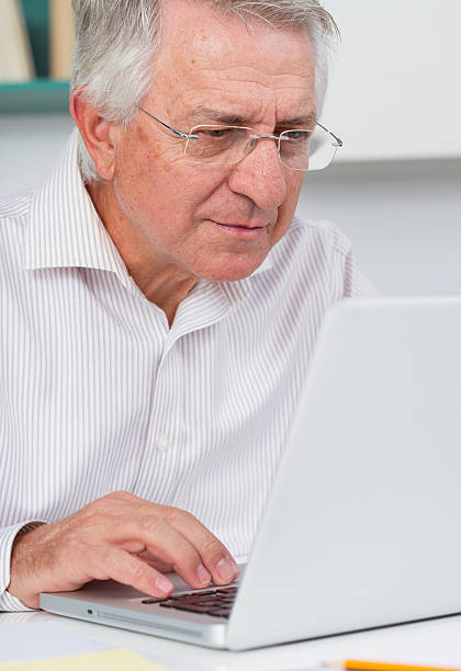 istock Mature man looking concentrate on her laptop 524153715