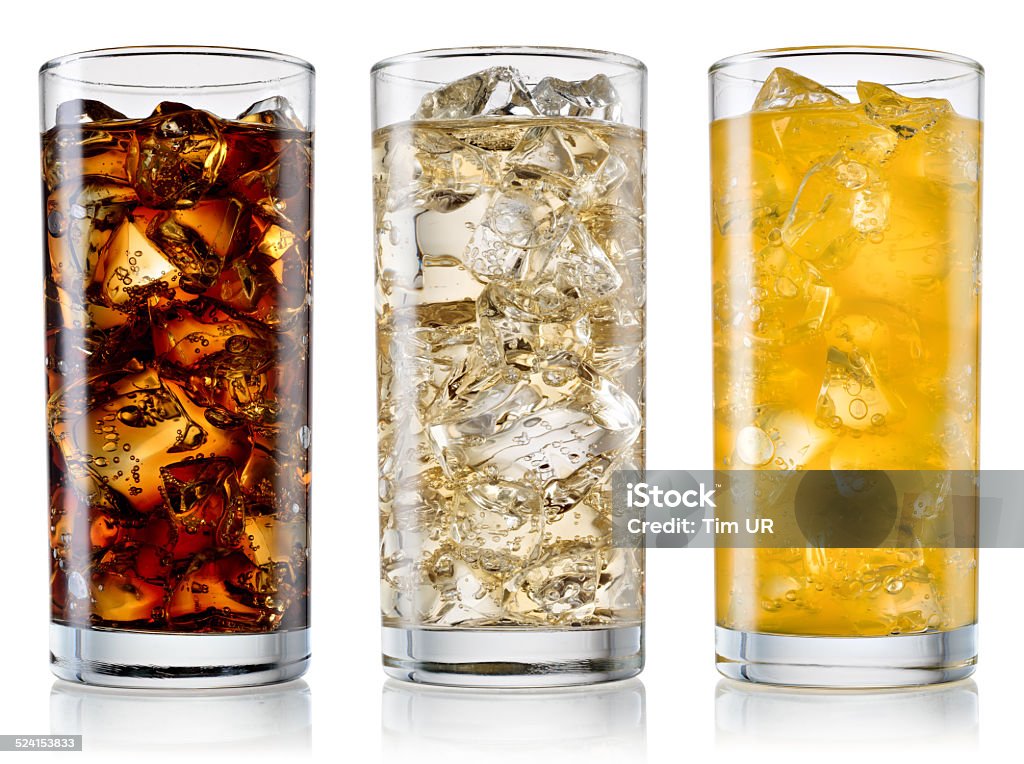 Glass of cola, fanta, sprite isolated. With clipping path Glass of cola, fanta, sprite with ice cubes isolated on white. With clipping path Soda Stock Photo