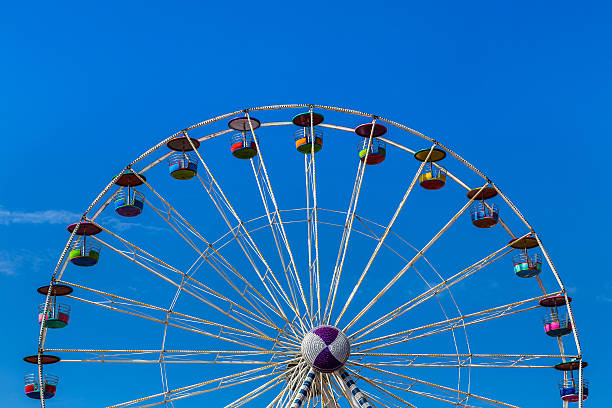 istock big colourful ferris wheel in amusement park 524154593