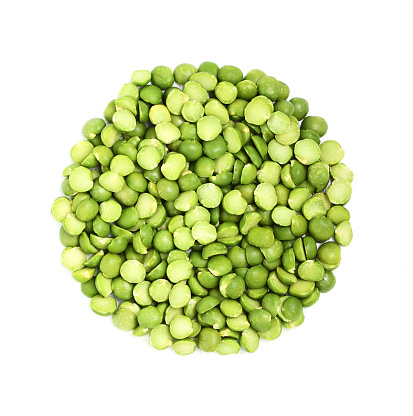 Green dry peas in the form of a circle isolated on a white background.