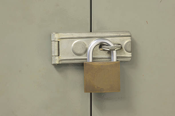 istock Locked cabinet door closeup background 524155325