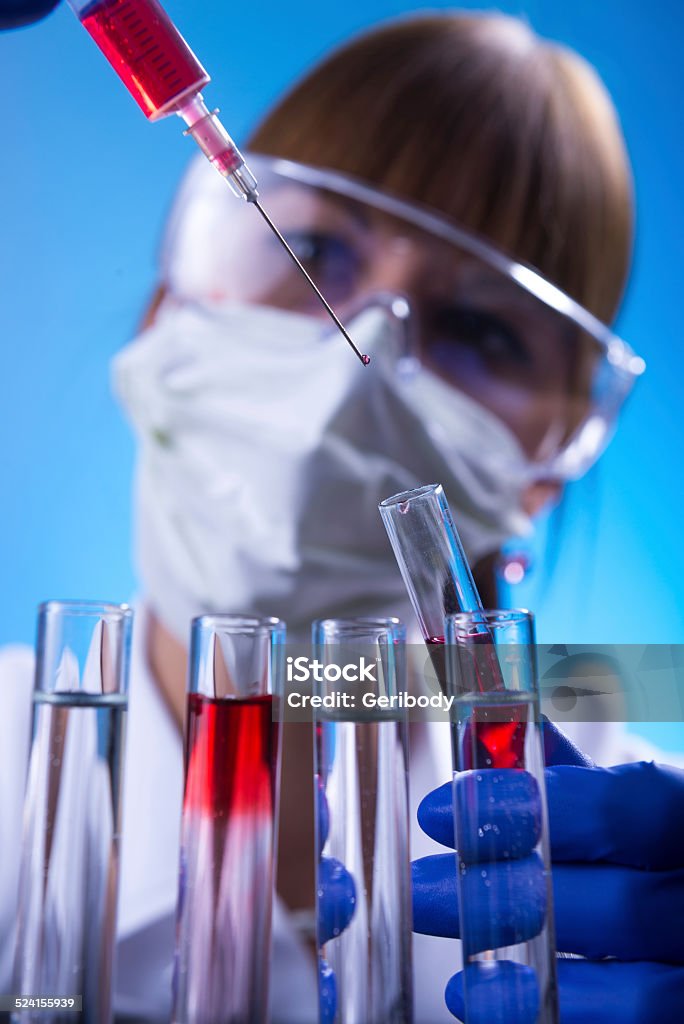 Laboratory,  Woman in the lab experimenting. Laboratory, The Woman in the lab experimenting. Adult Stock Photo