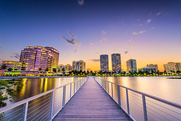 West Palm Beach West Palm Beach, Florida, USA downtown skyline on the intracoastal waterway. west palm beach stock pictures, royalty-free photos & images