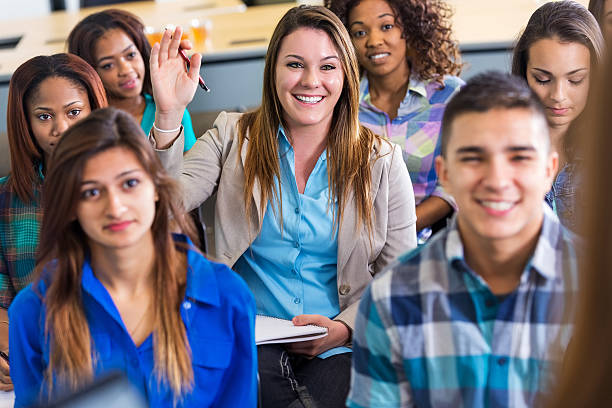 istock Professional young woman asking question during lecture or seminar 524156663