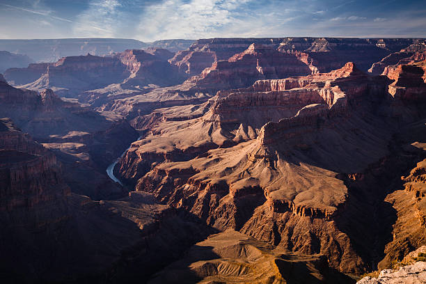 istock Grand Canyon Sunset Colorado River winding Desert red rocks  cliffs 524156958