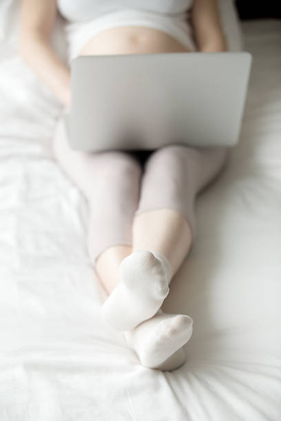 istock Pregnant woman working on laptop 524157664